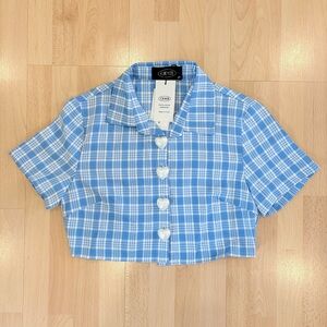 Cider | Cropped blue and white plaid button up shirt with heart buttons
